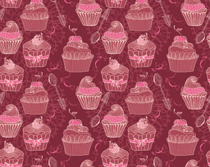 Seamless background with cupcakes