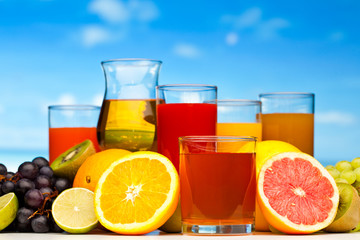 glasses of juice, fruits