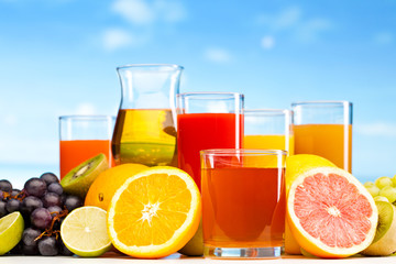 glasses of juice, fruits