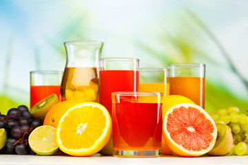 glasses of juice, fruits