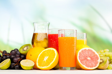 glasses of juice, fruits