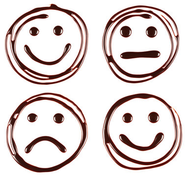set of smils faces made of chocolate syrup