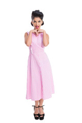 Happy woman wearing retro dress smiling at camera