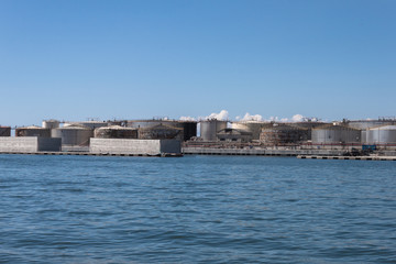 Fototapeta na wymiar Cisterns in the port of Genoa, Italy