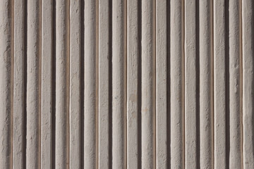 Vertical stony lines texture background