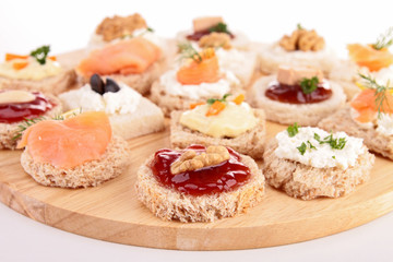 assortment of canape on board