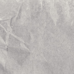 Obraz premium Crumpled natural gray recycled paper texture or background. Vi