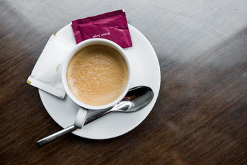 Cup of coffee on a wooden table