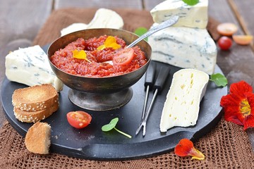 cheese plate with tomato chutney