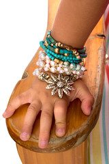 Little Girls Hand with Beads and Bracelets