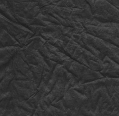black crumpled paper
