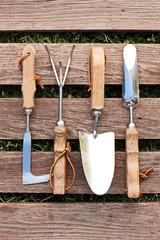 Gardening tools on wood board