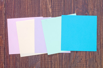 color paper on wooden background
