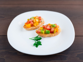 Delicious bruschetta with paprika and herbs