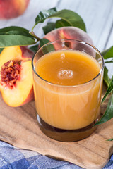 Glass with Peach Juice