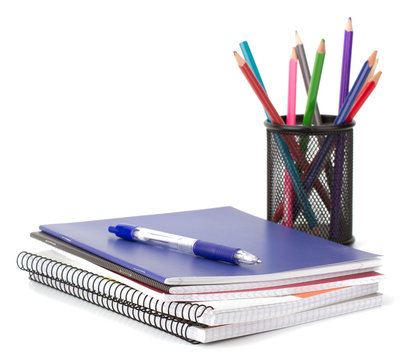 Notebook stack and pencils. Schoolchild and student studies acce