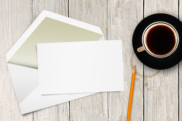 blank letter with envelope and coffee cup on the table