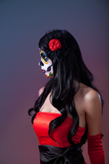 Profile shot of sugar skull girl