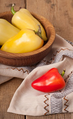 bell pepper on wooden dish