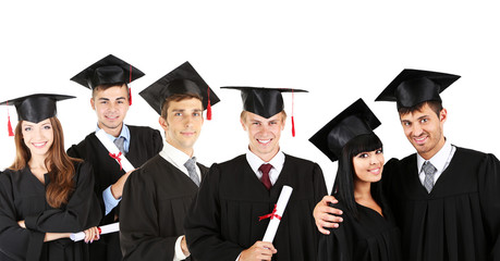 Young graduates isolated on white