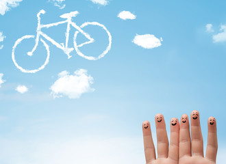 Happy smiley fingers looking at a bicycle shapeed cloud