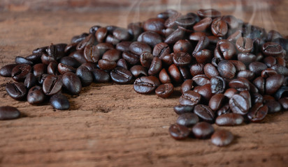 Still life Coffee beans on grunge wooden background