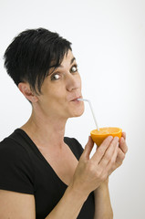 woman and sweet orange