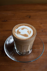 A glass of hot latte