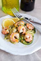 Zucchini noodles  with prawns and lemon zest