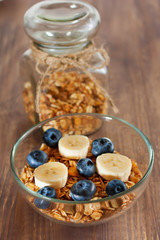 Healthy breakfast with granola and fruits