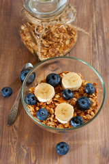 Healthy breakfast with granola and fruits