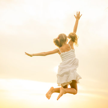 flying jumping beach girl at blue sea shore in summer vacation i