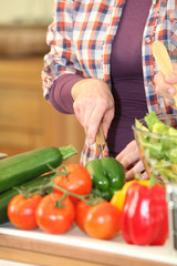 Woman chopping vegetables
