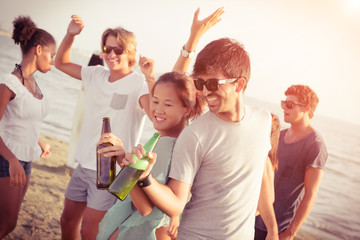 Group of Friends Having a Party at Beach..
