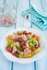 Rigatoni pasta with tuna, mixed tomatoes and pesto