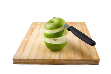 chipped apple on a cutting board