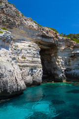 Pirate coast cliff cave at Menorca island, Spain.