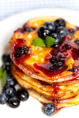 Blueberry pancakes with fresh blueberries