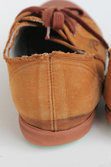 A pair of old canvas shoes