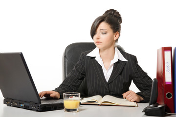 Woman working with computer in the office 