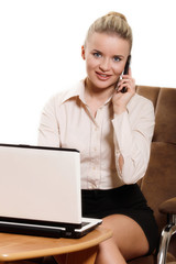 Young businesswoman talking on cellphone