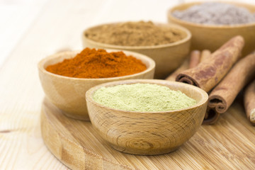 spices - rosemary, pepper, cardamon, cinnamon