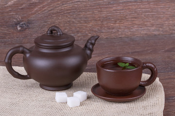 Green tea in clay cup