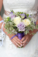bride holding a wedding bouquet