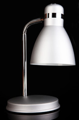 Table lamp on black background
