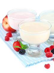Delicious yogurt with fruit and  berries isolated on white