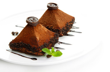 Delicious chocolate cakes isolated on white