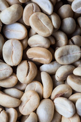 the green coffee beans background