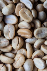 the green coffee beans background