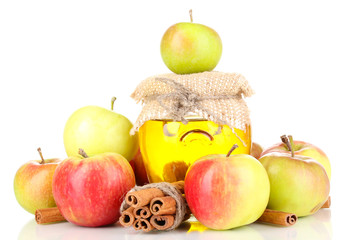 Honey and apples with cinnamon isolated on white